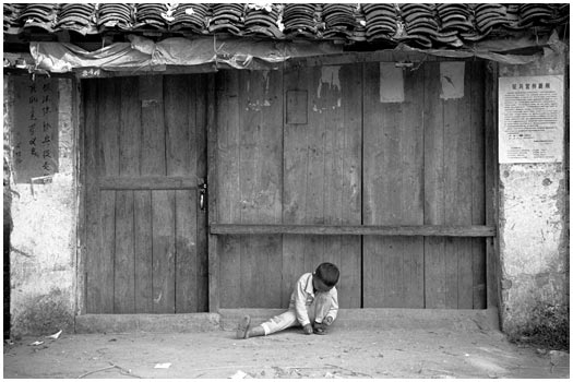 Playing kid Yangshuo, China