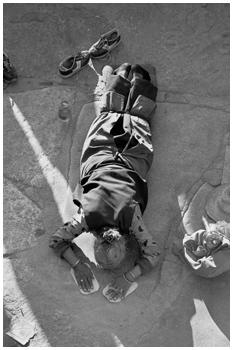 Prayer at Barkhor Square Lhasa, Tibet