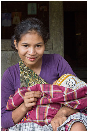  Woman with baby Bena Flores, Indonesia